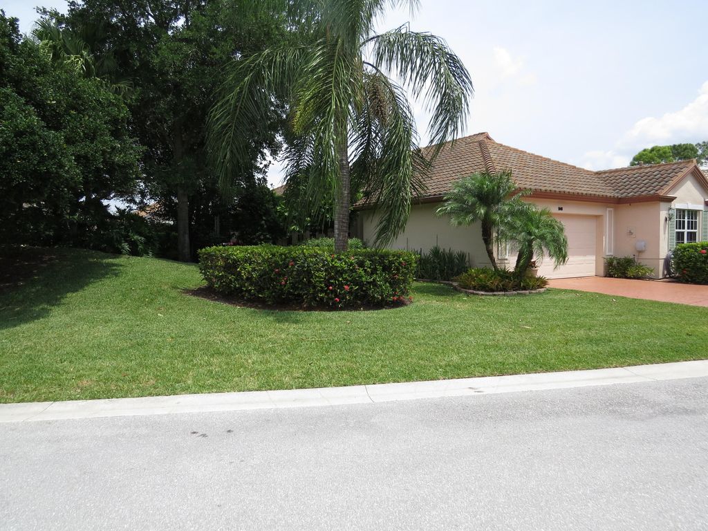 Photo of 941 Augusta Pointe Drive, Palm Beach Gardens, FL 33418 (MLS # R10790172)