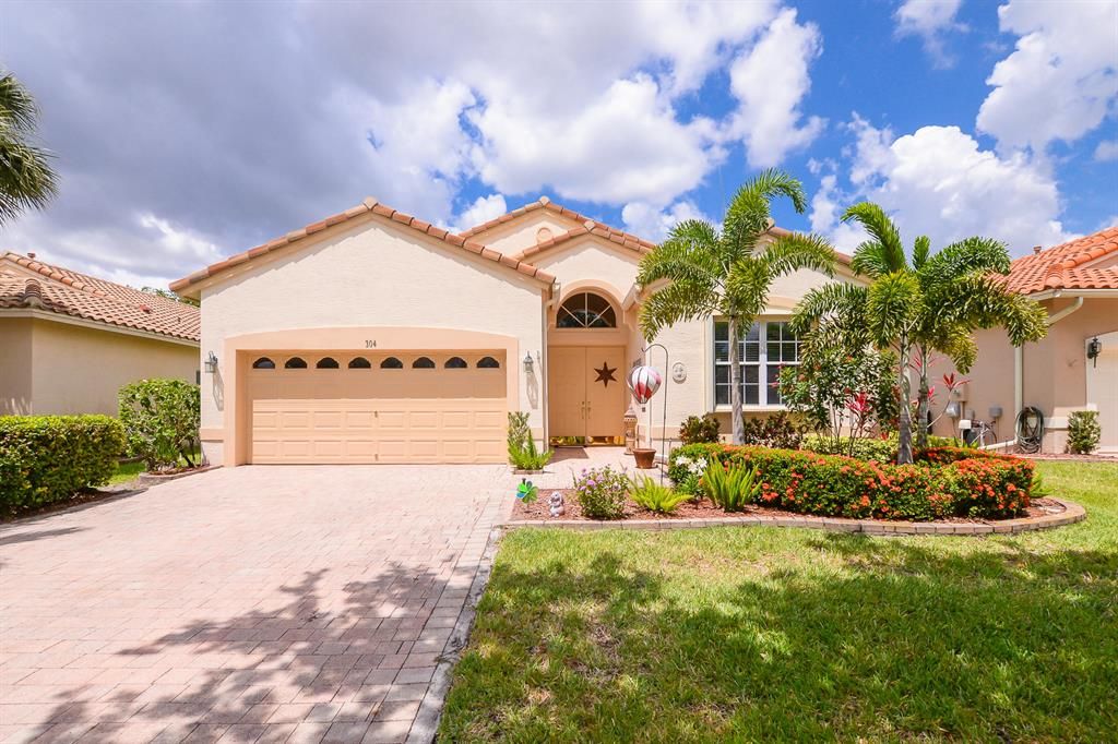 Photo of 304 NW Toscane Trail, Port Saint Lucie, FL 34986 (MLS # R10716016)