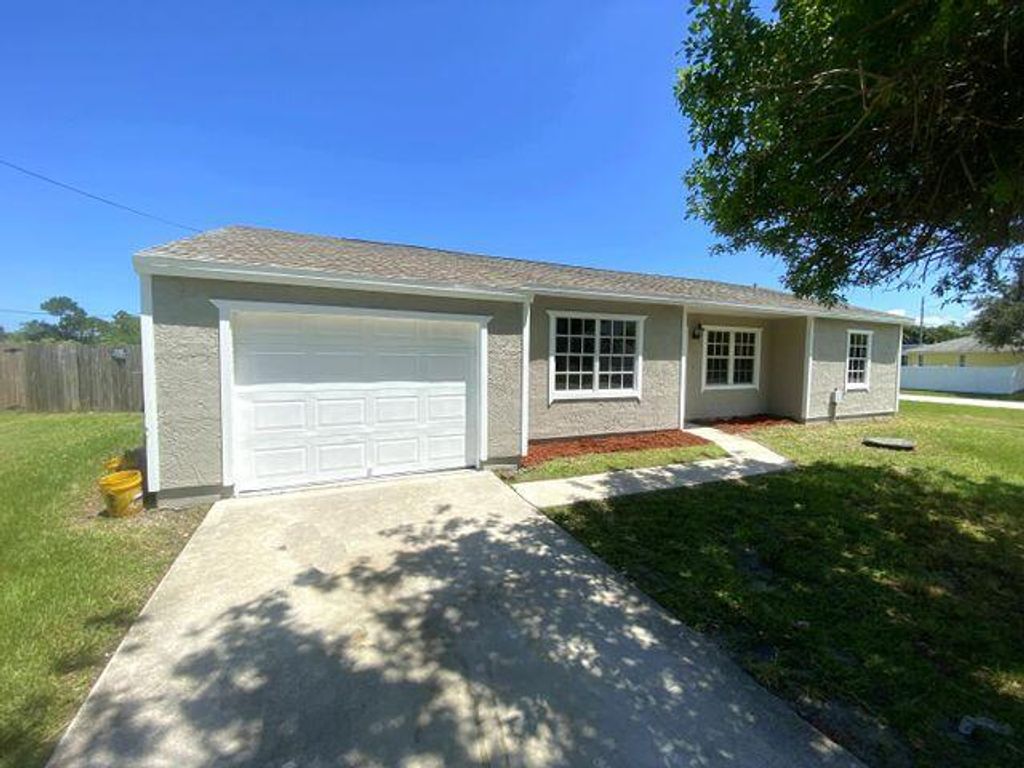 Photo of 2055 N Blackwell Drive SE, Port Saint Lucie, FL 34953 (MLS # R10734352)