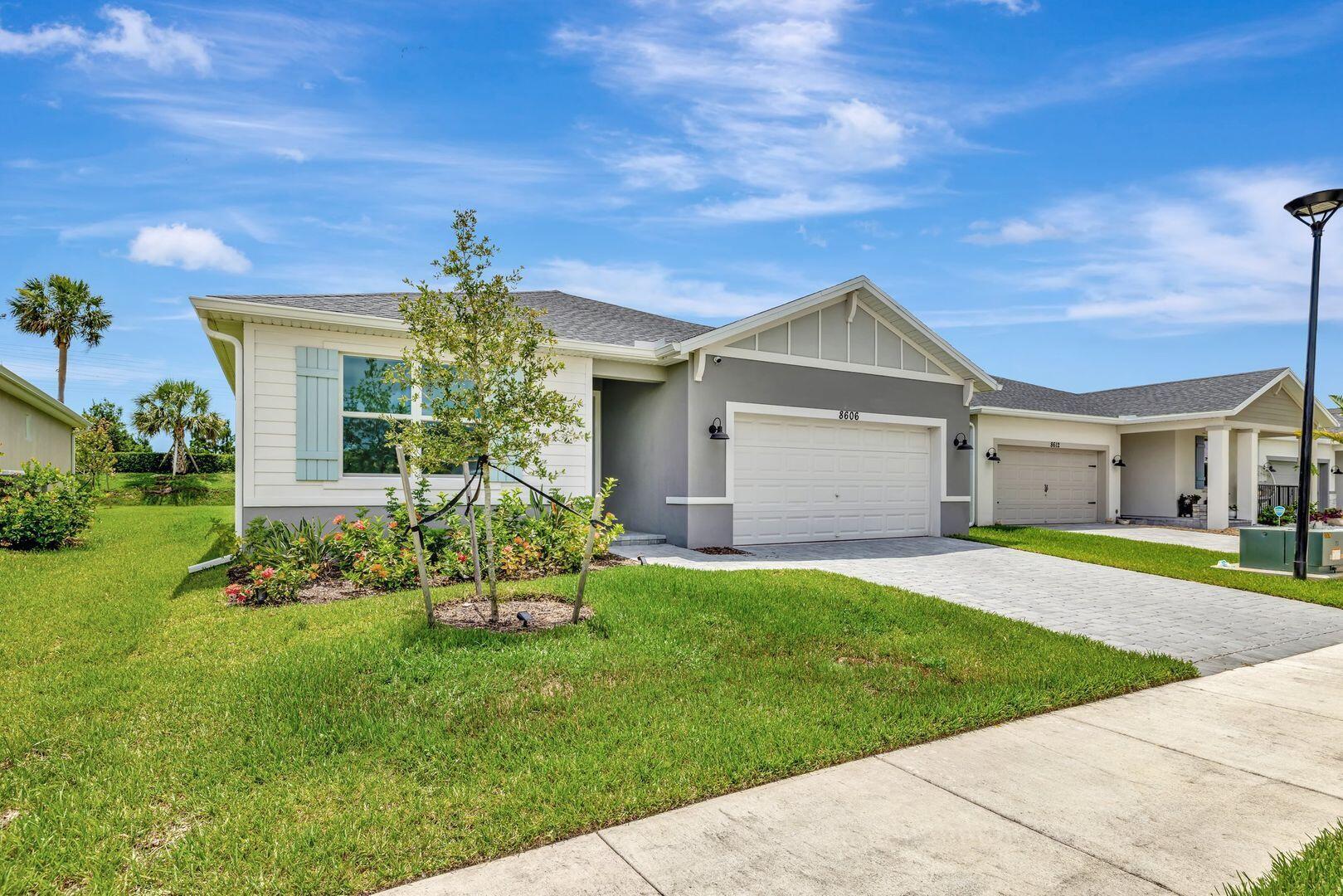 Spacious 4BR Home in Port St. Lucie - Modern Comfort AwaitsExperience comfort and space in this thoughtfully designed 4-bedroom, 3-bathroom home located in the highly desirable Azalea community of Port St. Lucie. This modern single-family residence features an open-concept floor plan with high ceilings, tile flooring in the main areas, and carpeted bedrooms for extra coziness. The spacious layout offers plenty of room to relax, work, or entertain--with a covered lanai that's perfect for morning coffee or evening wind-downs. Enjoy the convenience of a two-car garage, energy-efficient design, and a functional laundry room. The neighborhood provides easy access to St. Lucie West Town Center, golf, dining, and commuter routes--making it ideal for those who want both lifestyle and location.