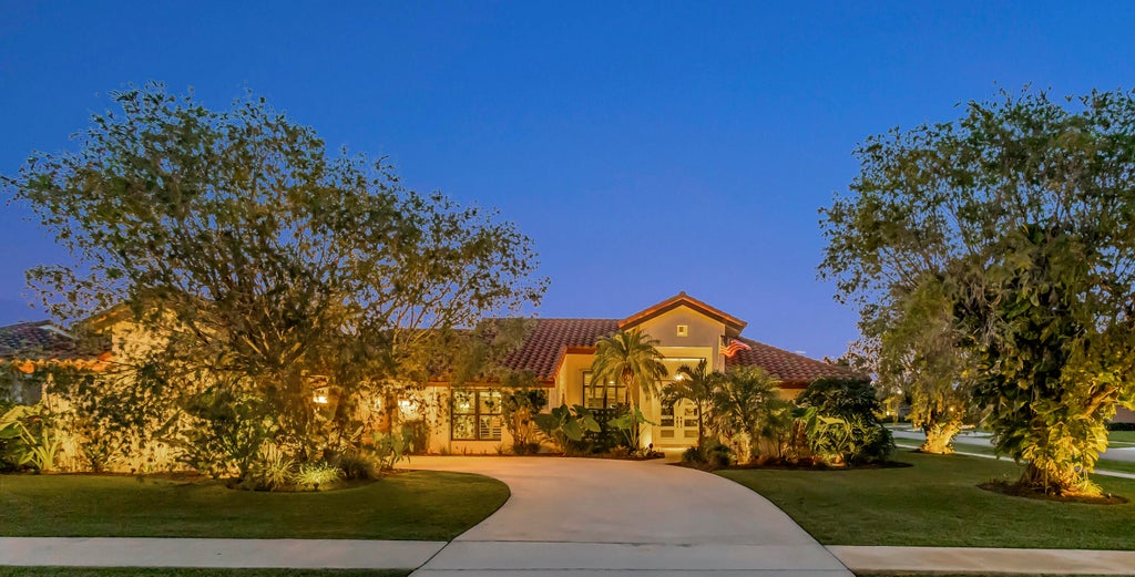Photo of 1945 Lynton Circle, Wellington, FL 33414 (MLS # B26041422)