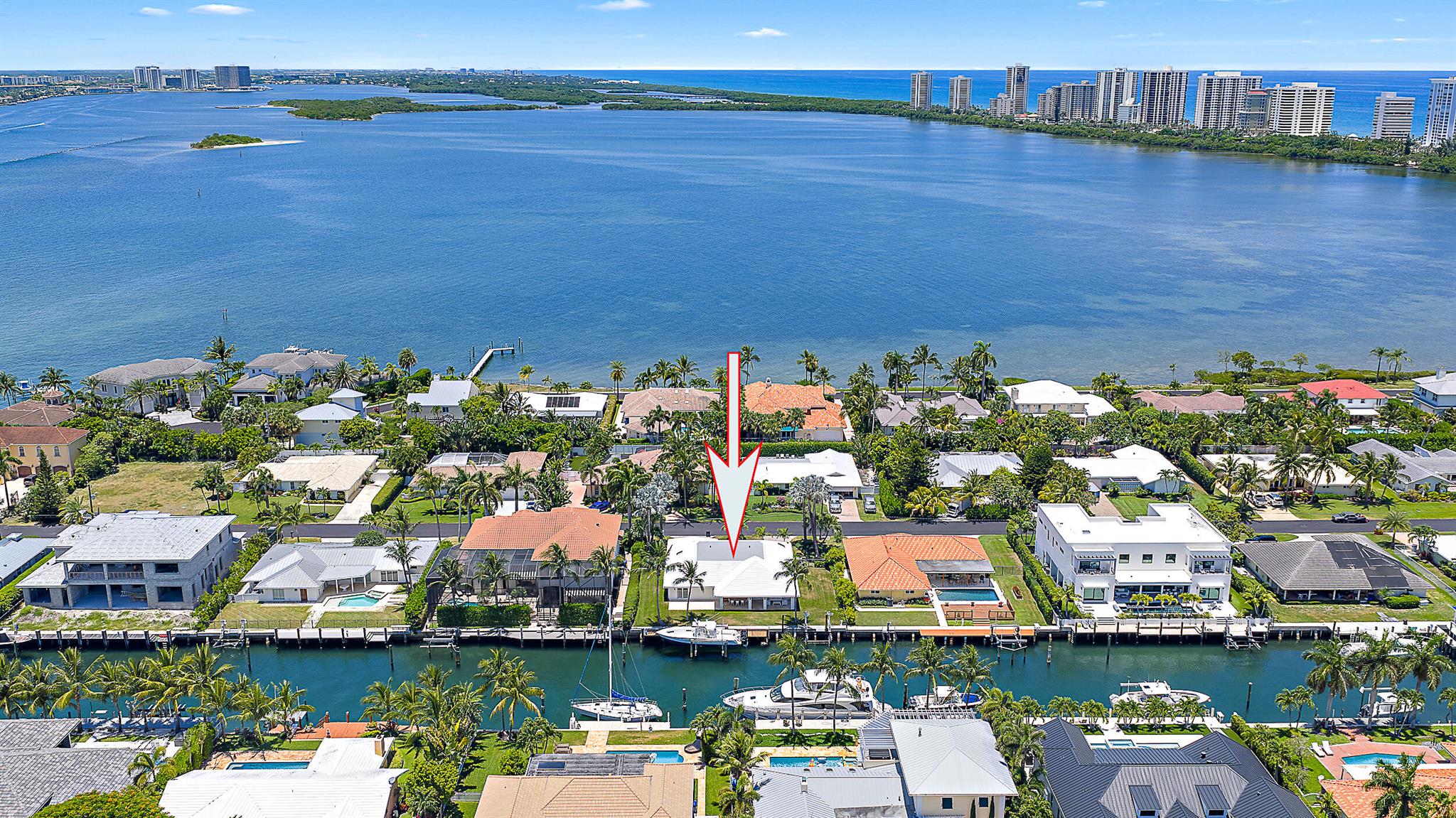 Just minutes from the Palm Beach Inlet this Palm Beach Isles home offers 100' of deepwater frontage, a 65' dock with two boat lifts: 24,000lbs & 10,000lbs. This home offers an updated kitchen with stainless appliances, updated bathrooms, new roof and impact windows 2023 and a 16KW Generac generator.