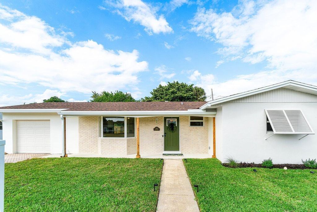 Photo of 2433 Palm Road, West Palm Beach, FL 33406 (MLS # B26051298)