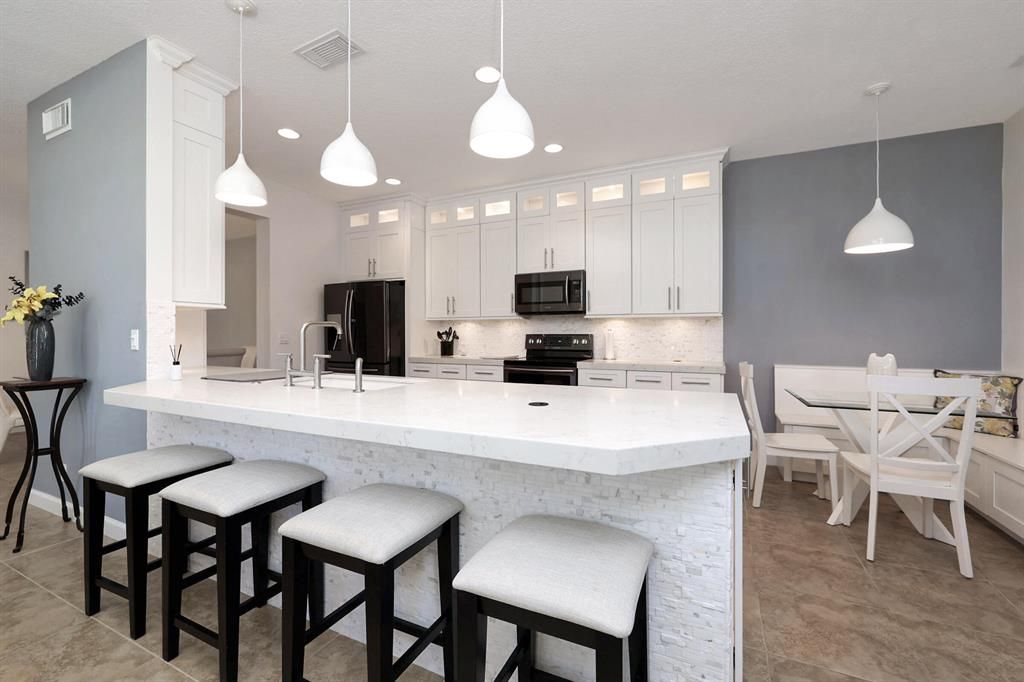 Photo of 10471 SW West Lawn Boulevard, Port Saint Lucie, FL 34987 (MLS # R10857556)