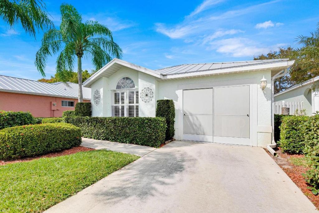 Photo of 3412 SW Coco Palm Drive, Palm City, FL 34990 (MLS # R10958681)