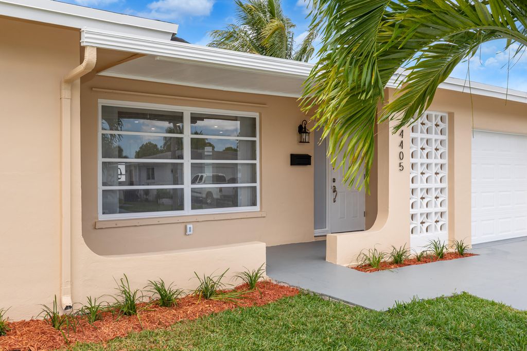 Photo of 4405 NW 43rd Terrace, Tamarac, FL 33319 (MLS # B26022003)