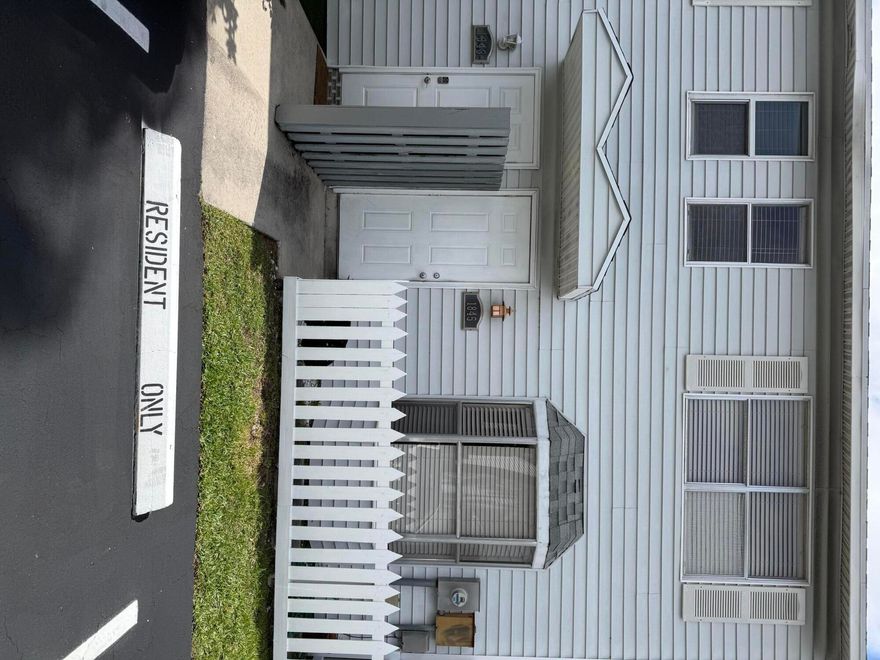 This two bedroom one and half bath in well sought after Edgewater Townhomes  a gated community. The townhome has a screened back porch with a yard with wooden fencing.  Beautiful community pool.