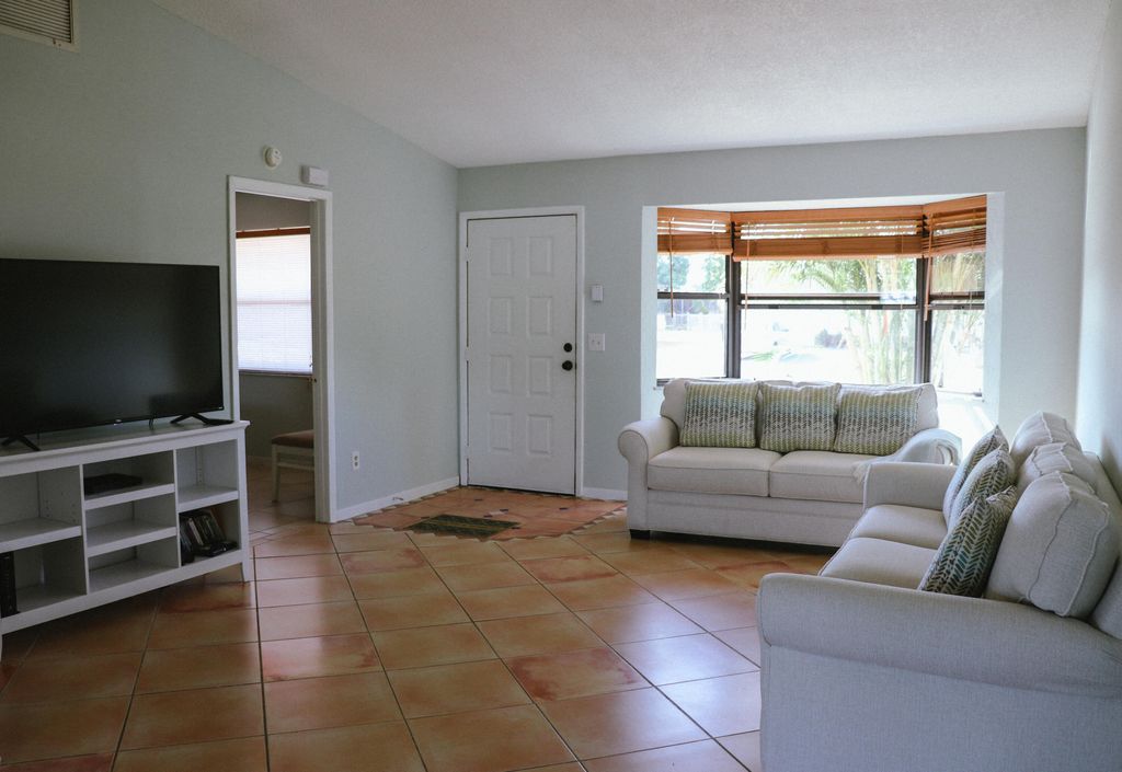 Photo of 444 SW Meadow Terrace, Port Saint Lucie, FL 34984 (MLS # R10986446)