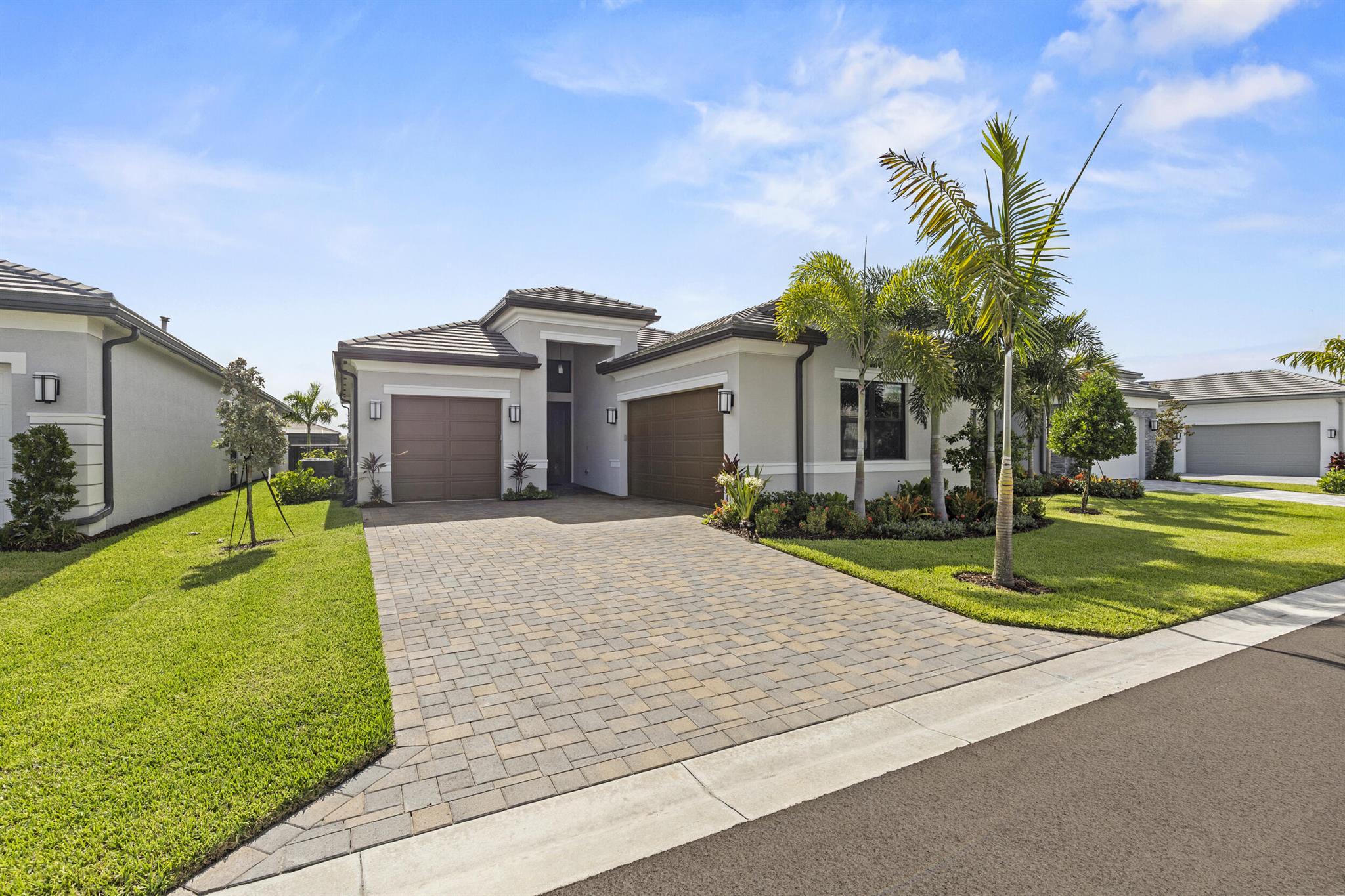 Why wait to build when you can have it all now? This never-lived-in Venice model in Valencia Grand 55+ stuns from the start--set on a premium lakefront lot with a sparkling pool and spa. Step inside to a chef's dream kitchen with gleaming stainless appliances, designer backsplash, and elegant countertops. Gorgeous floors flow throughout this 3 en-suite bedroom plus den home, additional high hat lighting for a brighter interior, complete with EV charger. Live like you're on vacation every day with a 30,000sf clubhouse, indoor pickleball, tennis, restaurant, and top-tier amenities. Welcome to your forever getaway!