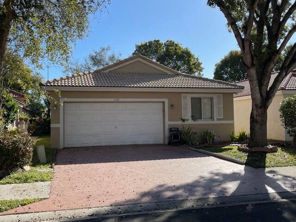 Photo of 6352 NW 36th Avenue, Coconut Creek, FL 33073 (MLS # B26006061)