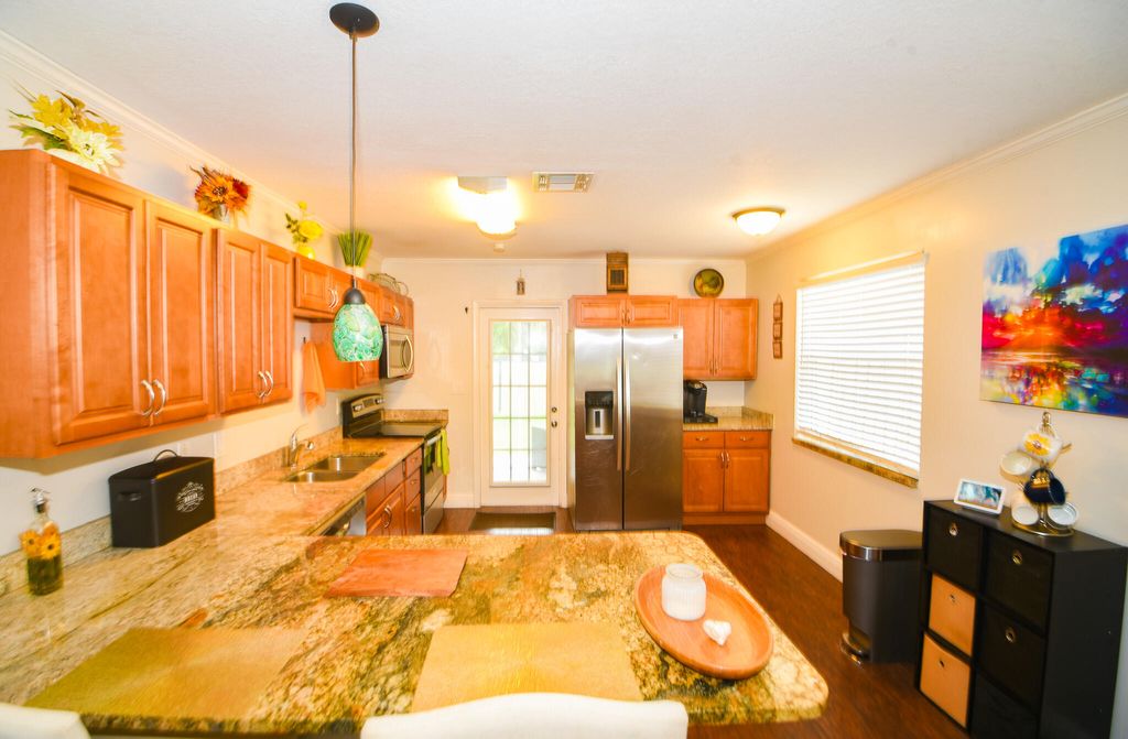 Photo of 5988 SE Avalon Drive, Stuart, FL 34997 (MLS # R10985951)