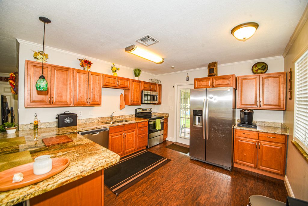 Photo of 5988 SE Avalon Drive, Stuart, FL 34997 (MLS # R10985951)