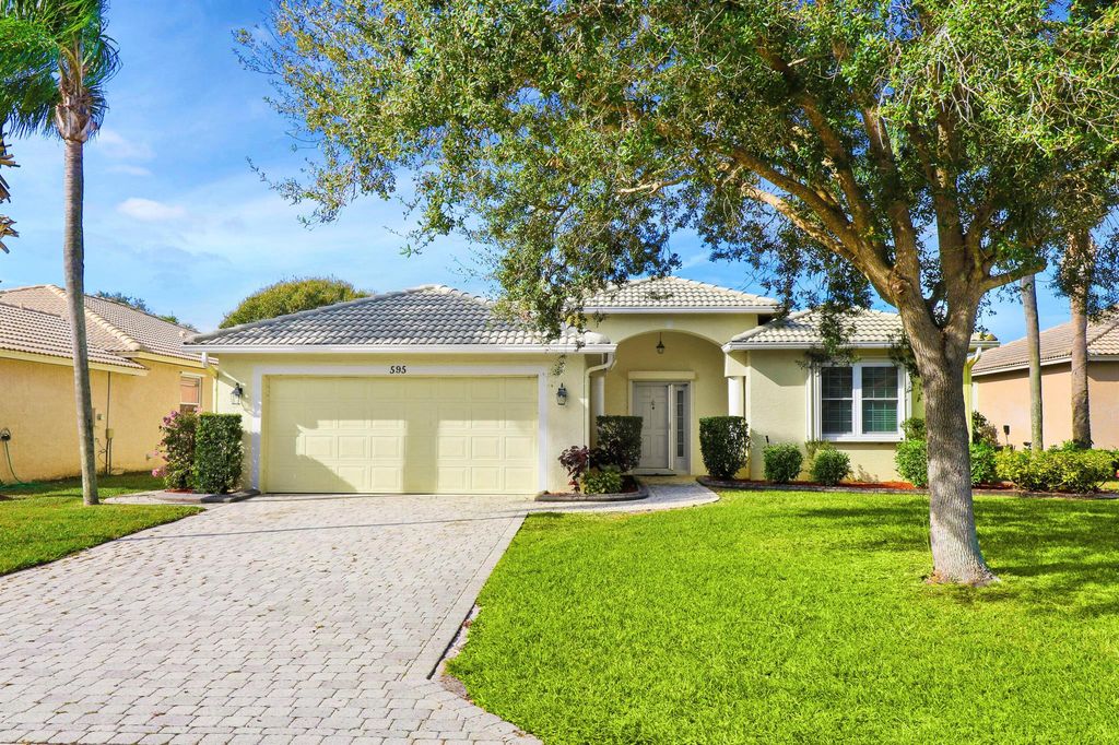 Photo of 595 NW Waverly Circle, Port Saint Lucie, FL 34983 (MLS # R11084026)