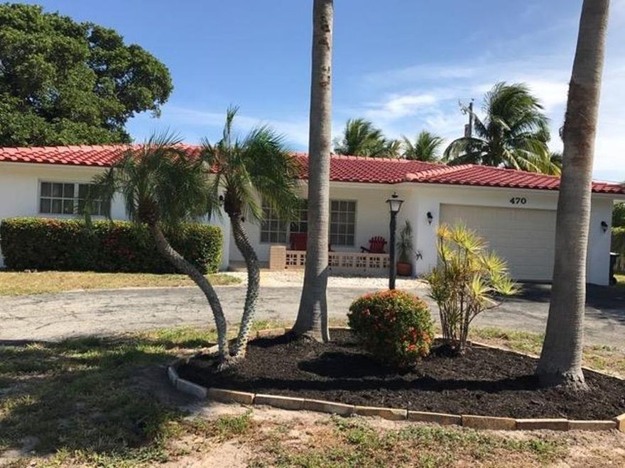 Just reduced! All offers considered! 2BR/2BTH in Boca Raton. Newly renovated kitchen and baths, Brand new Stainless steel appliances, granite counter tops, new roof and freshly painted inside and out. Great location! Centrally located close to Mizner Park, Boca Town Center, restaurants, shopping, Federal Highway and minutes to the beach. Corner lot with a circular driveway. Plenty of parking for family and friends. Fence was damaged during the hurricane. It will be repaired.