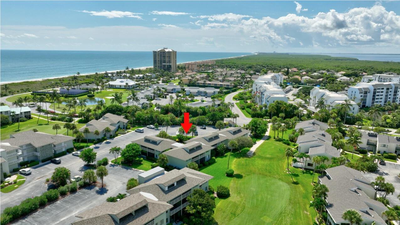 NEAR THE OCEAN! Adorable 1 bedroom 1 bath fully furnished ''Golf Villas'' condo at Ocean Village! Light & bright unit with vaulted ceiling, french doors to the bedroom, tile flooring, large screened balcony with great view of the golf course. Near the ocean & all Ocean Village amenities. Would be great rental unit if owner so desires. This condo can be rented by the week! Enjoy the best of Florida living at this beautiful oceanfront community offering 24 hr gated entry, 9 hole par 3 golf course, tennis, bocce ball, pickelball courts, 4 pools, new clubhouse & fitness center, oceanfront restaturant & tiki bar & 3500 feet of oceanfront. Located on Hutchinson Island with 21 miles of uncrowded & unspoiled beaches. Measurements approximate.