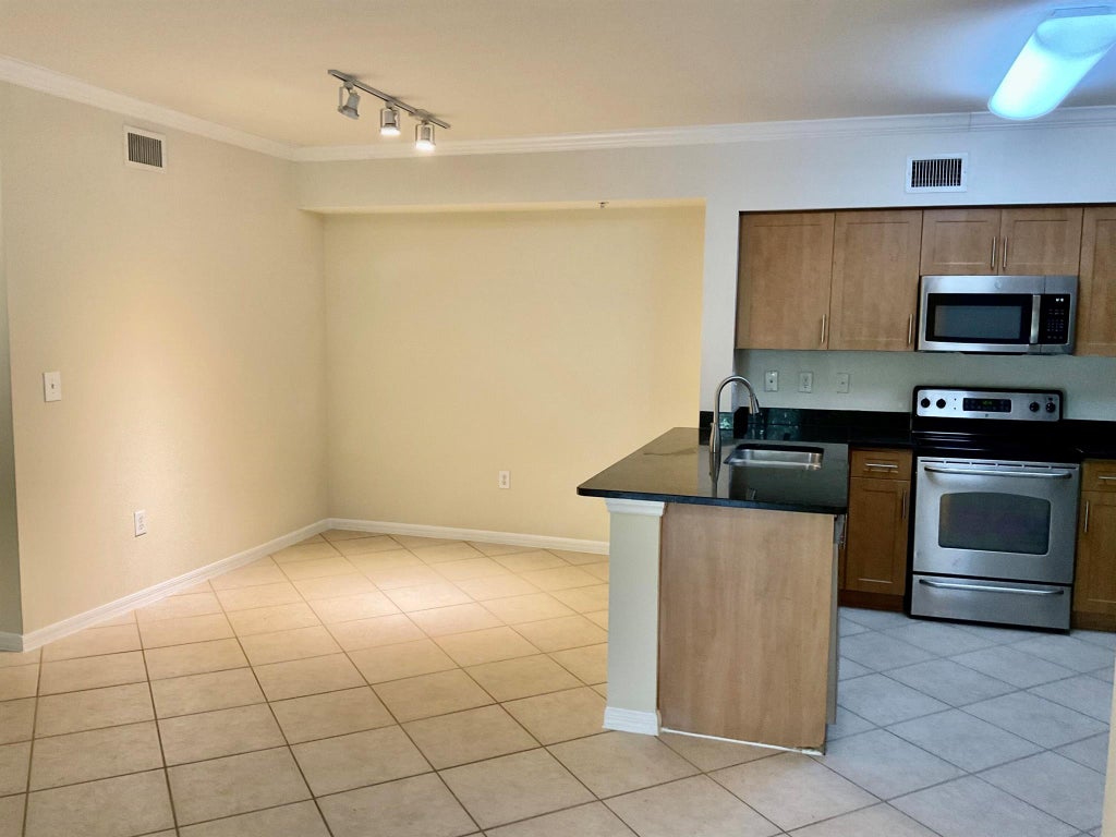 Photo of 6559 Emerald Dunes Drive #205, West Palm Beach, FL 33411 (MLS # R11114683)