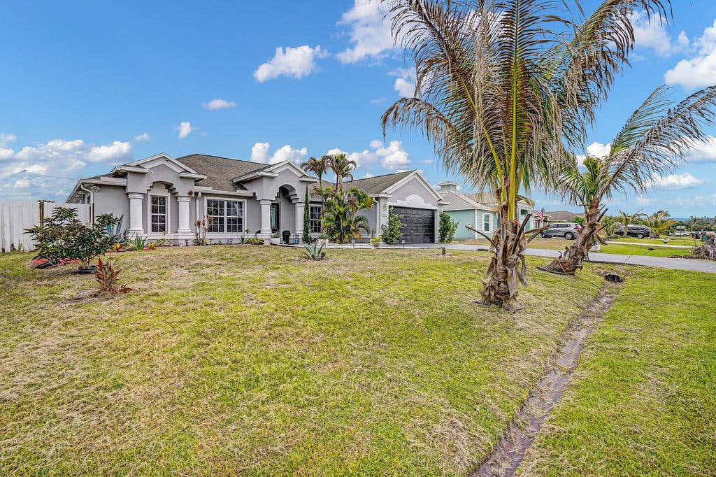 Photo of 981 SW Mccomkle Avenue, Port Saint Lucie, FL 34953 (MLS # B26040274)