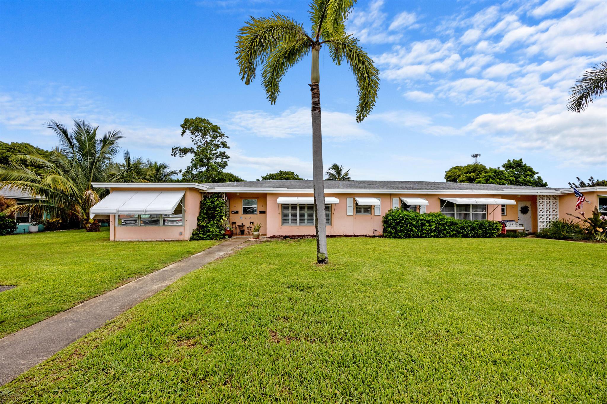 Neat & Clean villa style condo being offered furnished turnkey w/exclusions. Tile flooring throughout, large open living & dining area. Built in murphy bed perfect for guest. All windows offer plantation shutters. Primary bedroom w/ 2 walk in closets & ensuite w/ vanity area & combo tub/shower. Unit offers an additional Florida room great for an at home office. Galley style kitchen w/glass tile backsplash. Large open green space with patio & accordion shutters for rear windows. Updated Square D Electrical Panel. High Point Section 3 is centrally located in Boynton Beach minutes from the beach, fabulous restaurants & so much more!