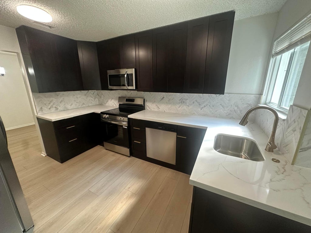 Photo of 9778 NICKELS Boulevard #507, Boynton Beach, FL 33436 (MLS # B26093359)