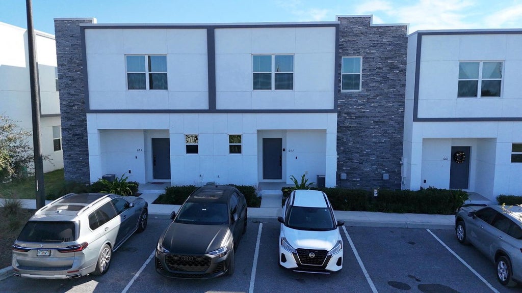 Photo of 653 Trikomo Drive, Davenport, FL 33896 (MLS # R11143126)
