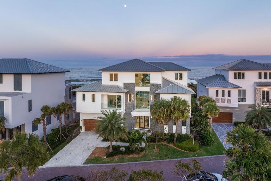 Indulge in coastal luxury with this newly built in 2022, over 10,250 tot sq', oceanfront retreat in the Aquavista community of North Hutchinson Island. Enjoy unparalleled privacy on a centrally located private road, shielded from neighboring condos and community entrance traffic. Revel in panoramic views from multiple terraces and patios offering both sunrise and sunset vistas. The residence features 48'' porcelain tile, white oak stair treads, and glass stair rails throughout. Take a dip in the infinity-edge private saltwater pool/spa—all while embracing the tranquil charm of the Atlantic Ocean. This 5-bedroom, 7-bathroom haven boasts garage parking for 6+ vehicles & all your toys. Experience culinary excellence in the gourmet kitchen featuring top-of-the-line Thermador and Bosch appliances. This Oceanfront oasis elevates every moment with 10-foot window heights in all formal areas, providing breathtaking views, complemented by 10-foot sliding glass doors that seamlessly blend indoor and outdoor living. Completely finished expansive 700+ sq ft guest retreat, a sanctuary within itself. This private space features a private entrance, full bathroom for convenience and two spacious walk-in closets, providing ample storage. Your guests will relish in comfort and luxury, ensuring a memorable stay in this oceanfront residence. This oceanfront abode goes beyond expectations, offering a dedicated office space with a full bathroom for utmost convenience. The property also features an open loft on the 3rd floor, perfect for a workout area or versatile use. Adding to the ease of living, an elevator ensures seamless access to all levels, combining functionality with the utmost sophistication. This coastal haven, designed by Randall Stofft, offers a perfect fusion of luxury, functionality, and panoramic beauty!!