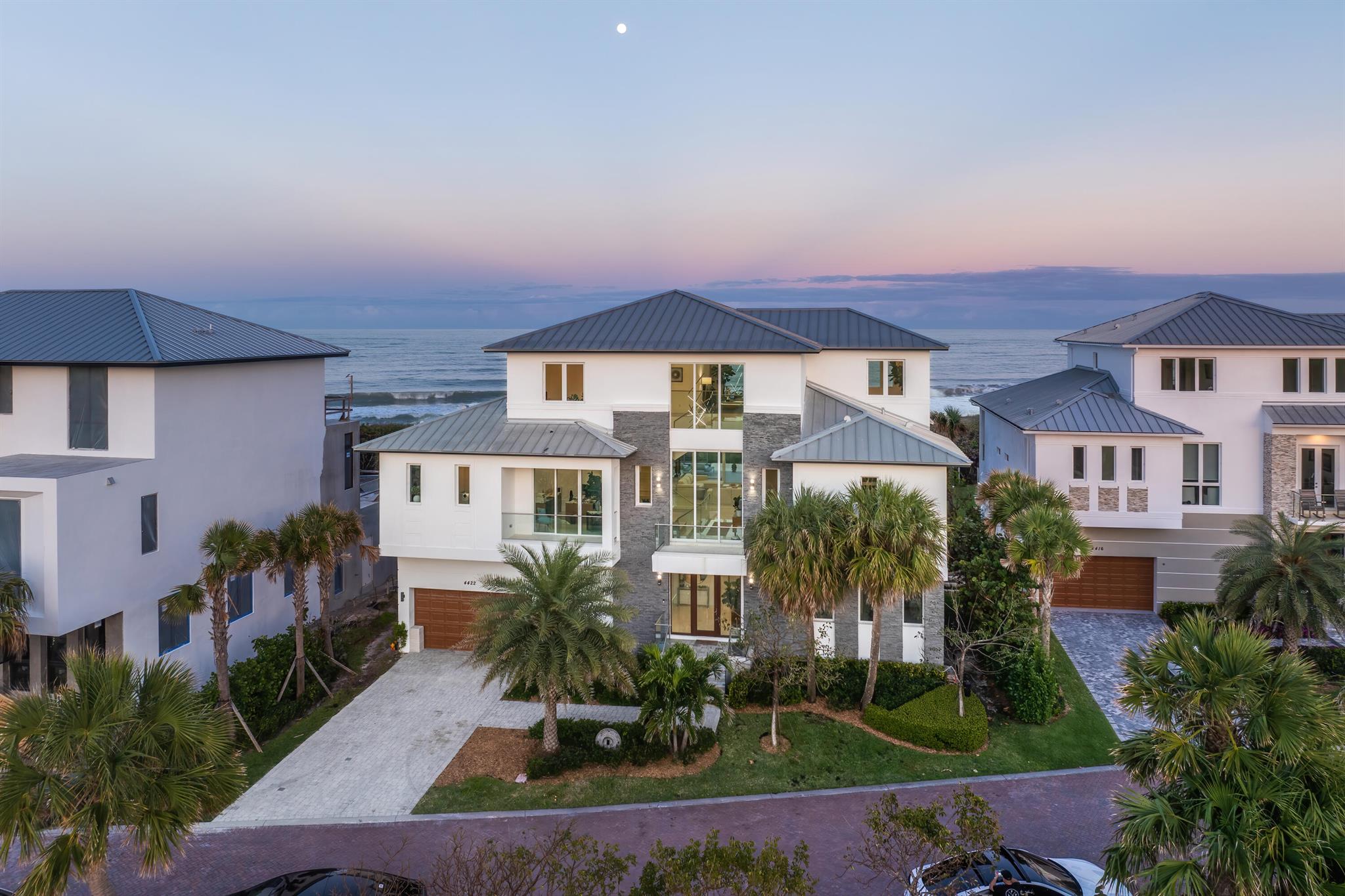 Indulge in coastal luxury with this newly built in 2022, over 10,250 tot sq', oceanfront retreat in the Aquavista community of North Hutchinson Island. Enjoy unparalleled privacy on a centrally located private road, shielded from neighboring condos and community entrance traffic. Revel in panoramic views from multiple terraces and patios offering both sunrise and sunset vistas. The residence features 48'' porcelain tile, white oak stair treads, and glass stair rails throughout. Take a dip in the infinity-edge private saltwater pool/spa--all while embracing the tranquil charm of the Atlantic Ocean. This 5-bedroom, 7-bathroom haven boasts garage parking for 6+ vehicles & all your toys. Experience culinary excellence in the gourmet kitchen featuring top-of-the-line Thermador and