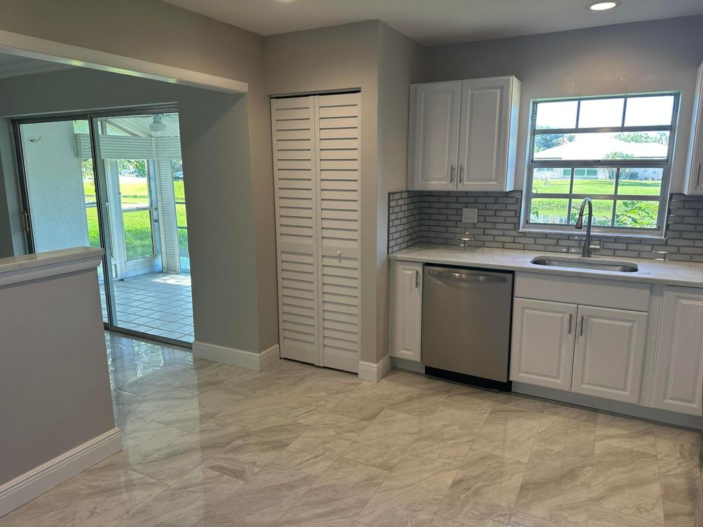 Photo of 5796 Moss Court #7, Fort Pierce, FL 34982 (MLS # B26026100)