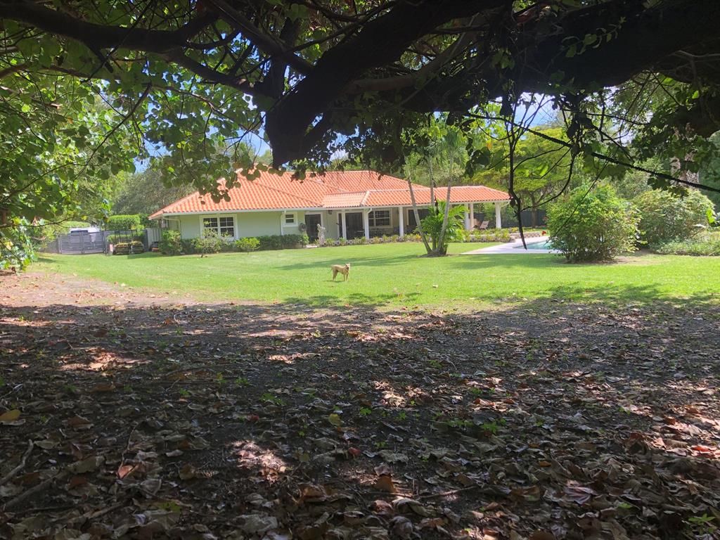 Photo of 5659 Whirlaway Road, Palm Beach Gardens, FL 33418 (MLS # R10719486)