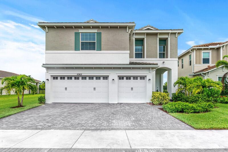 This gorgeous Westlake home is the ultimate dream come true! With 5 spacious bedrooms, 4 full baths, a 3-car garage, and over $70k in builder upgrades! As you approach the home, the pavered driveway and elegant entryway greet you, leading you through double doors into the formal dining and living areas. The open-concept floor plan designed for easy entertaining, features a neutral color palette that complements any decor. The main floor boasts stunning wood-look tile flooring throughout, creating a seamless flow between all living spaces.
