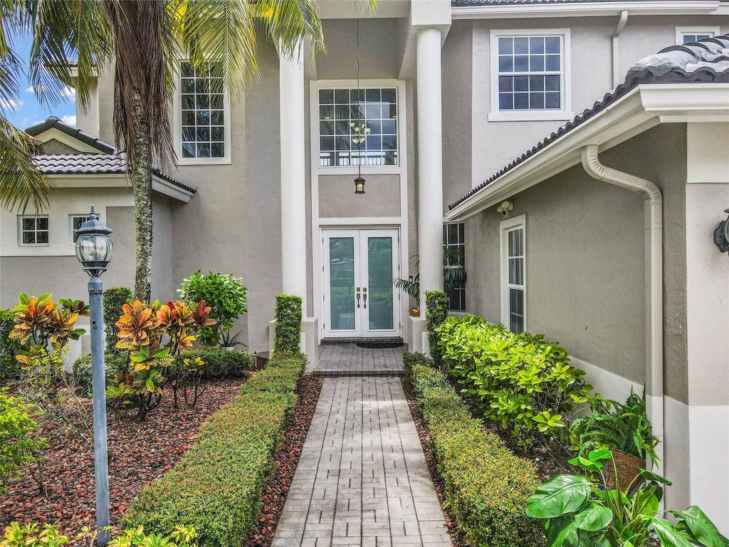 Photo of 10982 NW 70th Ct, Parkland, FL 33076 (MLS # F10531234)
