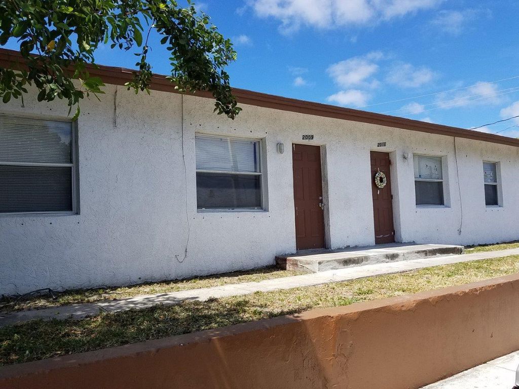 Photo of 2009 Division Avenue, West Palm Beach, FL 33407 (MLS # B26000490)