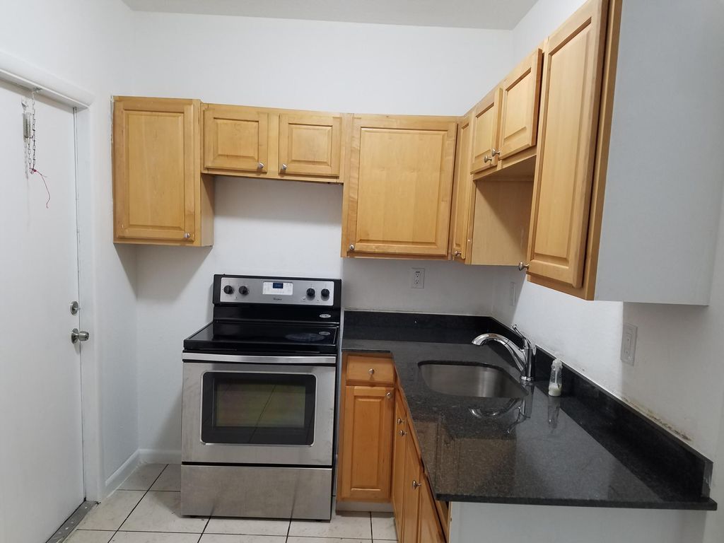 Photo of 2009 Division Avenue, West Palm Beach, FL 33407 (MLS # B26000490)