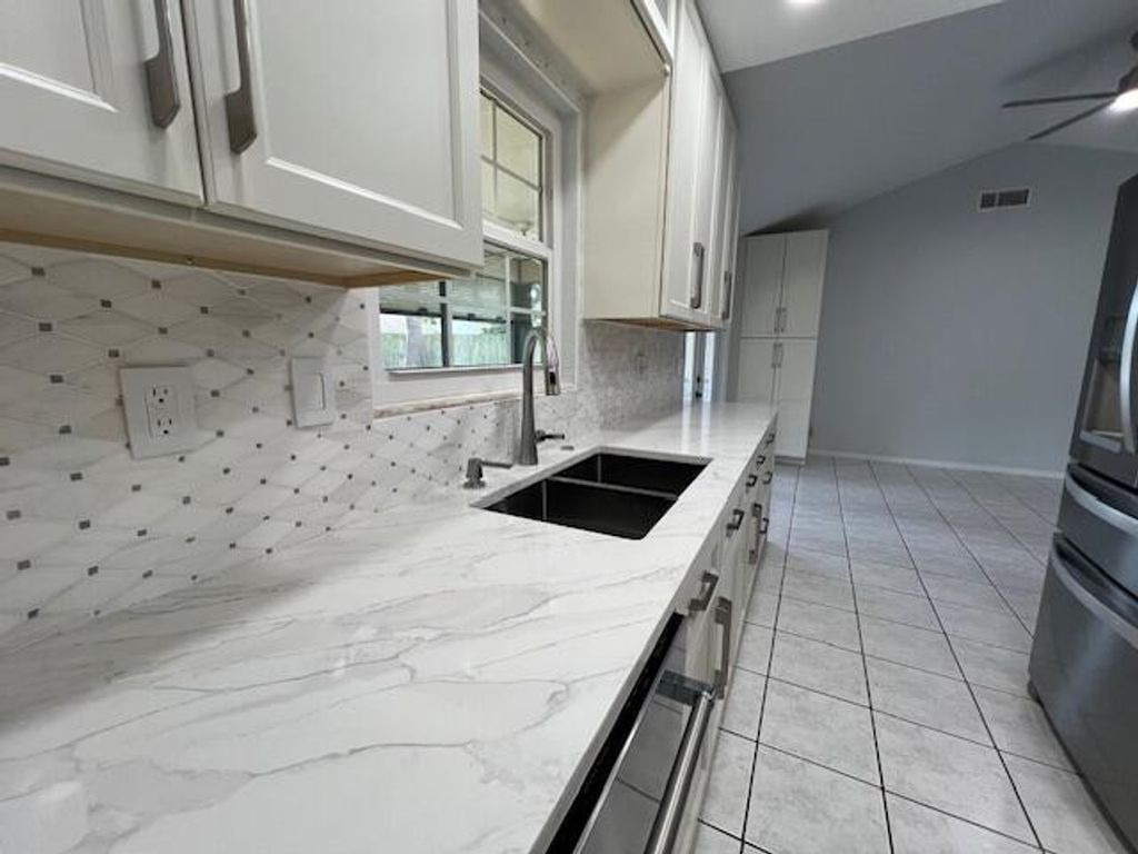 Photo of 414 Las Palmas Street, Royal Palm Beach, FL 33411 (MLS # B26007280)