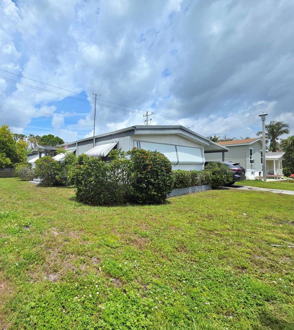 Photo of 471 NW 135th Way, Plantation, FL 33325 (MLS # B26028357)