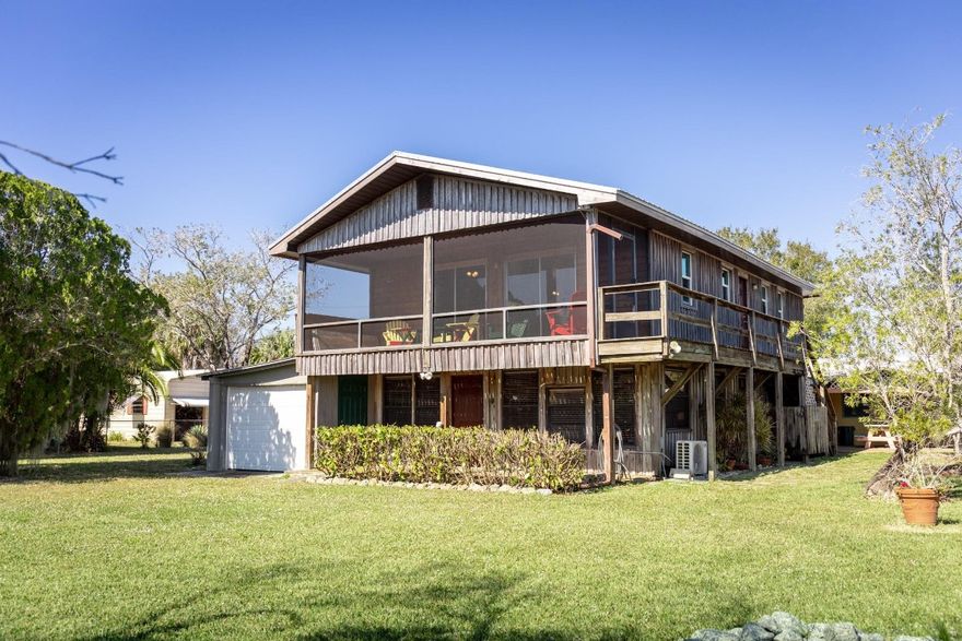 ~ OLD FLORIDA CHARM ~ With breathtaking waterfront views in this newly renovated 2BR/2BA retreat on the Rim Canal. Tucked away in a quiet setting, this property offers the perfect blend of privacy, comfort, and outdoor living. Completely updated with a new metal roof (2024), new HVAC systems, kitchen, bathroom, flooring, knotty pine walls & ceilings, and insulation (2025). Extras include a 2-car garage, oversized metal boat garage, workshop, fire pit, and ample storage—this is Florida living. A true fisherman’s delight with over 200’ of improved seawall, step-down boat deck, side canal access, fish cleaning station, dock house, and direct access to the water. Whether you’re looking for a full-time home, private weekend getaway, or income-producing Airbnb, the possibilities are endless.