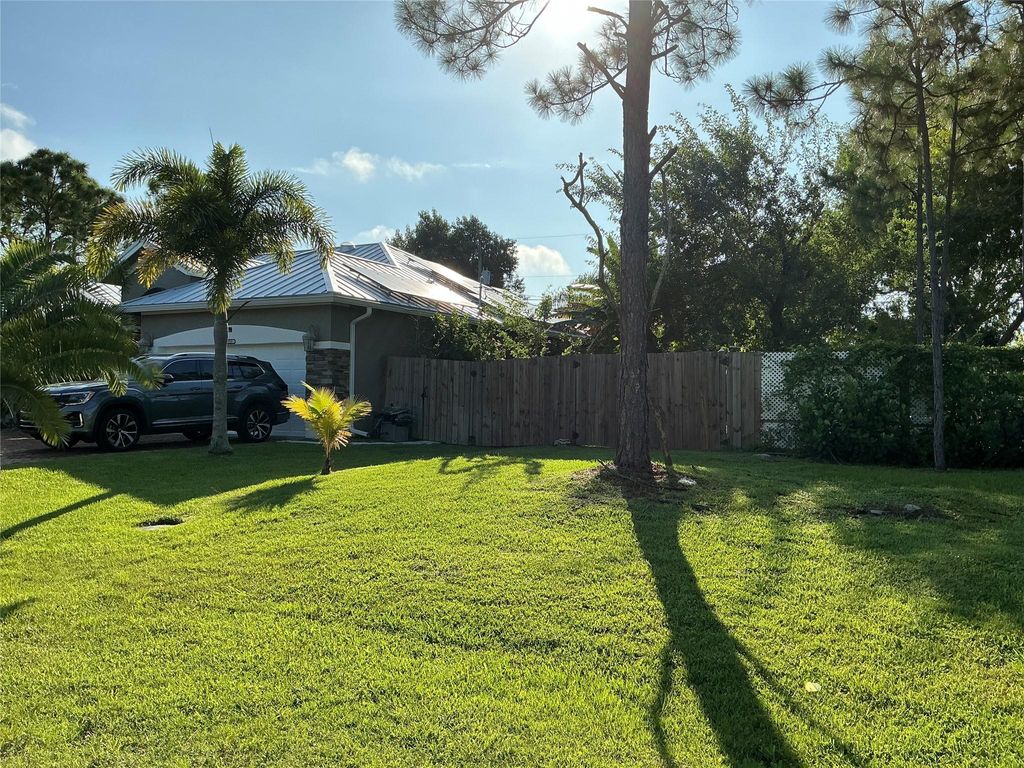 Photo of 1765 SW Columbia Street, Port Saint Lucie, FL 34987 (MLS # F10469192)