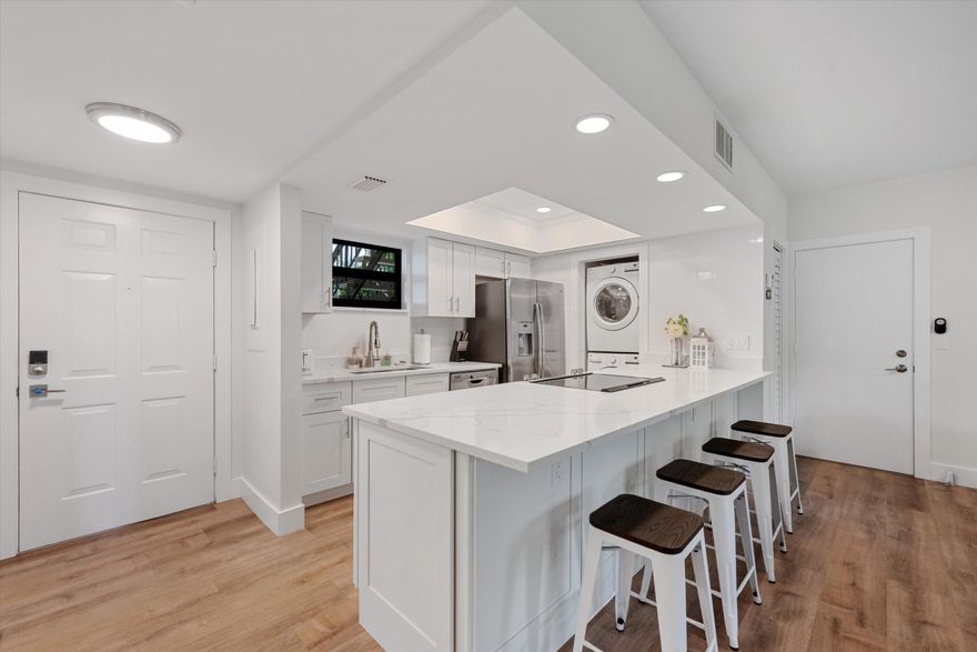 Beautifully updated fully furnished first floor 1BR/1BA condo with tranquil garden views is located in the highly sought-after Palm Beach Polo Club. This spacious layout features a full kitchen, in-unit washer/dryer, and covered patio. Available for the off-season at $2,100/month, with utilities included.  Ideally situated in the desirable Bagatelle community near the West Gate, this charming residence offers exceptional convenience just minutes from premier shopping, dining, and world-class equestrian venues.  This light and bright unit has been thoughtfully renovated and is just steps from the newly updated community pool. Turnkey and available in June.