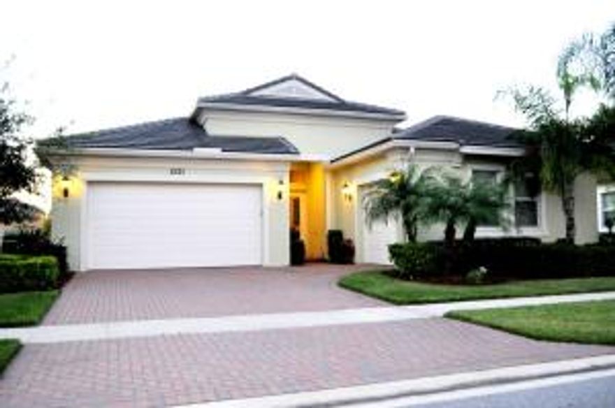 A stunning 4BR 3BA single story home on cul-de-sac, built in 2012.  This upgraded home is in PortoSol and has the potential for a 5 bedroom with En-suite.  Built with attention to detail, this architectural gem features 18" tile, gourmet kitchen (beautiful granite counters and rich looking dark wood cabinets), S/S appliances, & 3-Zone A/C, luxurious spa & pool. The Kitchen, great room, living room & large master bedroom all overlook a quiet lake view and luxurious pool &spa, far from all traffic noise. Perfect for entertaining, the expansive outdoor loggia is complete with cool decking & lake view setting creating an oasis of privacy with resort-styled salt water pool & spa. Tropical landscaping and beautiful home well-cared for inside & out. This home is an absolute must see!