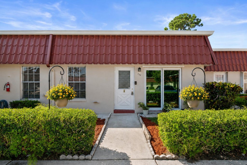 Photo of 742 Nantucket Circle, Lake Worth, FL 33467 (MLS # B26063996)