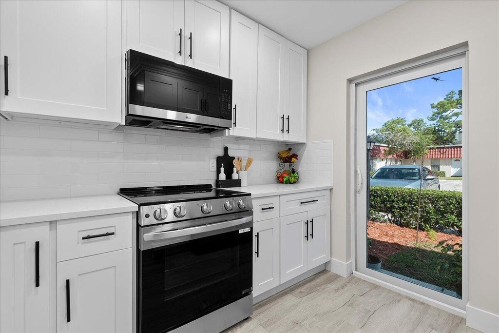 Photo of 742 Nantucket Circle, Lake Worth, FL 33467 (MLS # B26063996)
