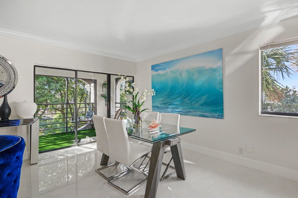 Photo of 6328 W Longboat Ln LN W #403, Boca Raton, FL 33433 (MLS # B26039481)