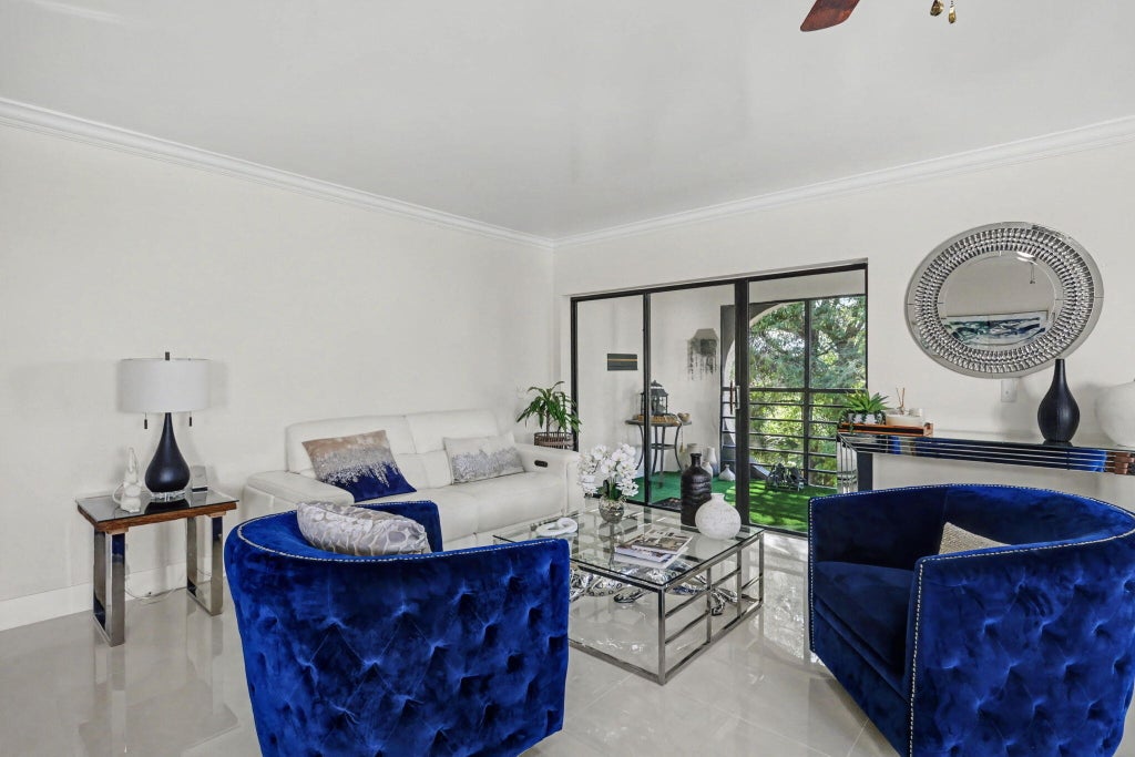 Photo of 6328 W Longboat Ln LN W #403, Boca Raton, FL 33433 (MLS # B26039481)