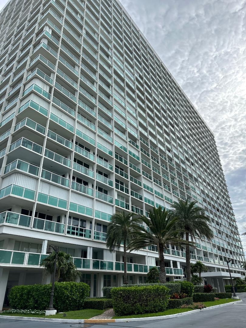 AMAZING 2 BEDROOM 2 BATH CONDO WITH SPECTACULAR VIEWS OF THE BEACH, OCEAN. WATCH THE CRUISE SHIPS, AS YOU RELAX IN THIS BEAUTIFUL CONDO. WOOD KITCHEN CABINETS WITH GRANITE COUNTERTOPS, HUGE MASTER BEDROOM, ETC. RENT INCLUDES GARAGE PARKING, CABLE AND WATER. WILL RENT ANNUALLY OR SEASONALLY. PRIVATE BEACH, POOL, RESTAURANT, GYMS, LIBRARY, CONFERENCE ROOMS, CAR WASH AND MORE.