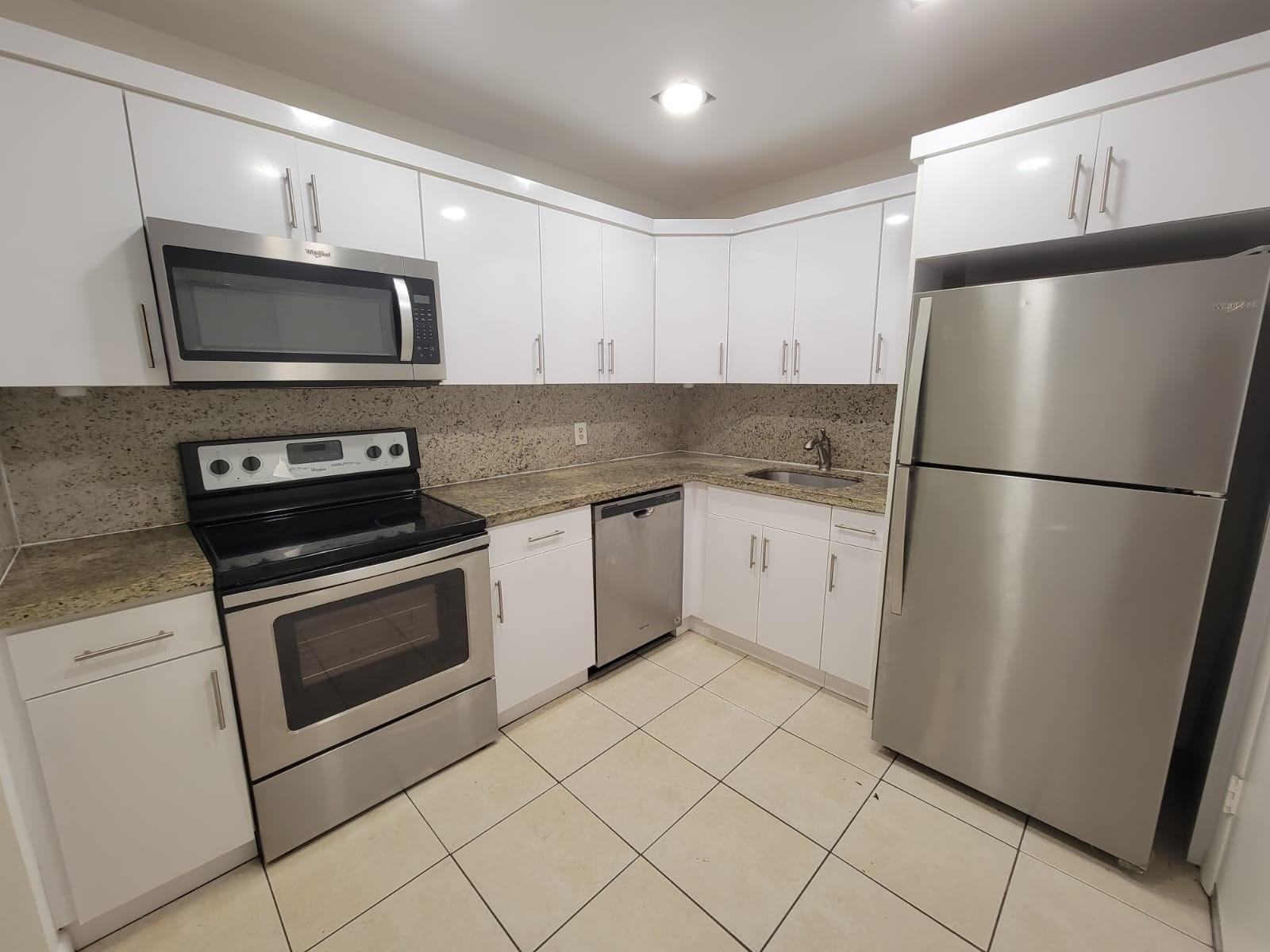 Spacious two-bedroom/two-bathroom condo on the 1st floor of a boutique-style building in Hollywood. The unit features an open layout with an abundance of natural light, ceramic tile floors throughout, spacious closets, granite countertops in the kitchen, and new stainless steel appliances. Enjoy the panoramic view from the screened balcony. The building offers access control, elevator, and on-site laundry and is conveniently close to Young Circle Park, supermarkets, restaurants, major highways, and a short drive to the beach. Comes with an assigned parking space with street parking also available.----------UNIT RENTED TILL 1/31/2025, PAYS $2,000.00 PER MONTH - TENANT CAN SHOW THE UNIT WITH 24HS NOTICE