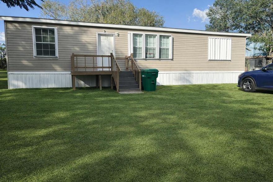 LAND LEASE! Enjoy comfortable Florida living in this charming 2-bedroom, 2-bathroom home located in beautiful Okeechobee, Florida. This well-maintained property offers a functional layout with bright living spaces, a welcoming kitchen, and spacious bedrooms designed for everyday comfort. Enjoy the relaxed lifestyle Okeechobee is known for—close to Lake Okeechobee, outdoor recreation, shopping, and dining. Perfect as a full-time residence, seasonal retreat, or investment opportunity. Don't miss your chance to own a piece of Florida's laid-back charm.