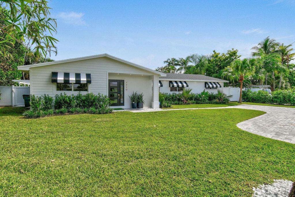 Photo of 7710 W Lake Drive, Lake Clarke Shores, FL 33406 (MLS # R11147728)