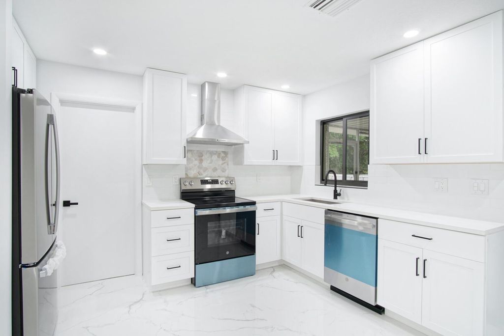 Photo of 435 NE Solida Circle, Port Saint Lucie, FL 34953 (MLS # R11148132)