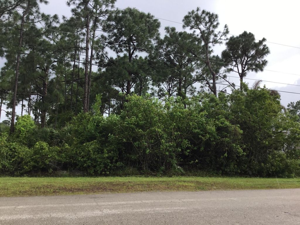 Photo of 5925 NW Hann Drive, Port Saint Lucie, FL 34986 (MLS # B26018009)