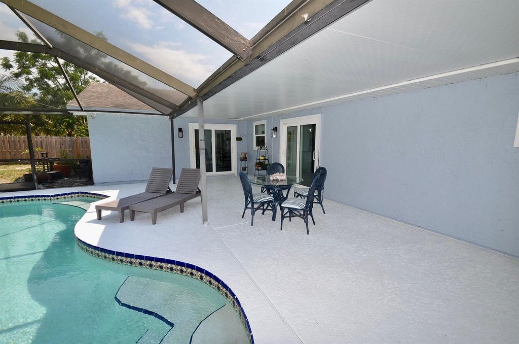 Photo of 2044 SE Crowberry Drive, Port Saint Lucie, FL 34983 (MLS # R10998250)