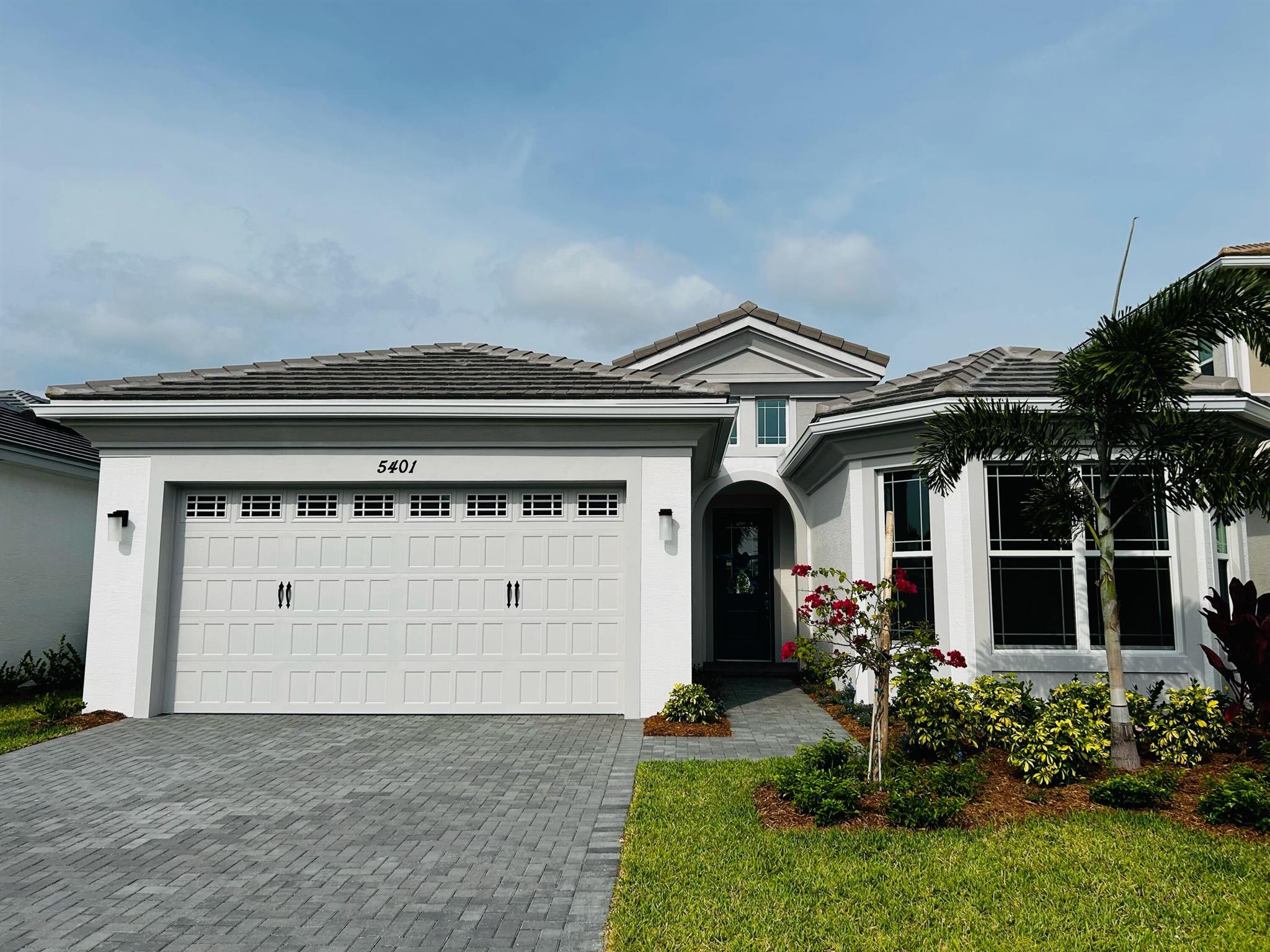 Absolutely stunning 3 bedroom, 2.5 bath plus den new construction home. Tile though all the house, all Impact windows. Live in a resort style Westlake community include a lagoon pool with 3 story slide, splash pad for little ones, cabanas, lawn space for parties, outdoor concert pavilion, basketball courts, adult pool and multi-purpose building, playground, dog park, pump park for BMX enthusiasts and much more. 30 minute drive to the ocean. Close to West Palm Beach airport. A-rated schools assigned. Lots of shops , restaurant